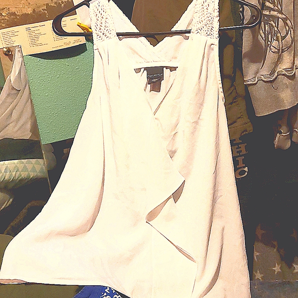 Covington sleeveless flare blouse